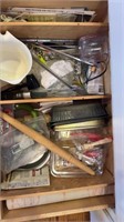 Large drawer of baking dishes and utensils
