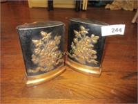 Pair of black and gold floral bookends
