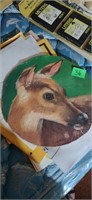 Small round Larry Adams painting of a deer