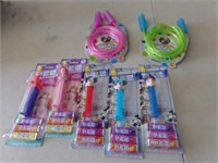 5 unopened PEZ and jump ropes