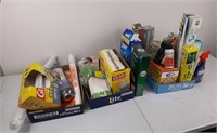 Assortment of cleaning supplies, garbage bags,