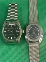 Pair of men's stainless steel watches