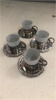 4 cup & saucer set. Marked Italy