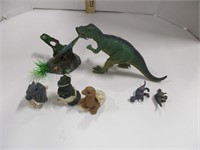 Dinosaurs with hatchings & crashed plane