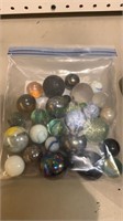 Bag of vintage glass marbles includes at least