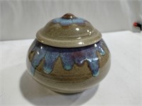 Pottery container with lid  signed