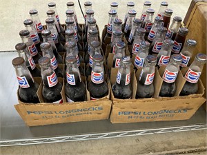 2 boxes of Pepsi bottles