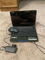 Mini Acer laptop and mouse