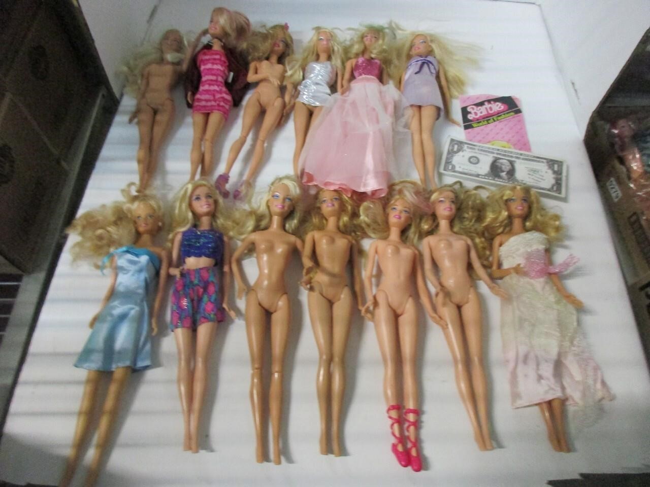Vintage and newer Barbies with clothes