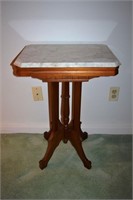 Carved walnut rectangular marble top pedestal tabl