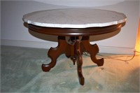 Carved walnut shaped marble top coffee table