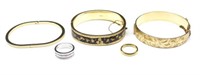 A group of three bangles and two rings