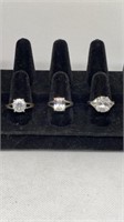 Group of sterling fashion rings all marked 925,