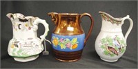 Group three early ceramic table jugs