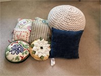 Footstool and assorted pillows