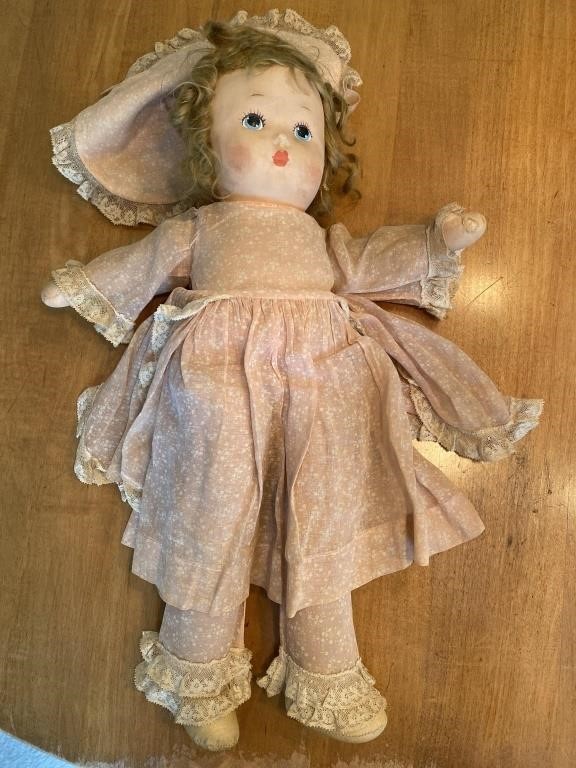 Vintage musical doll approximately 90 years old