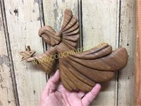 Handcarved wooden angel with star