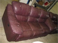 Leather sofa with reclining seats. Measures 88"