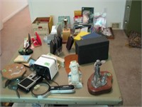Tabletop of misc office supplies and decor