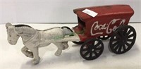 Cast iron horse drawn Coca-Cola wagon measuring 3