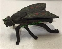 Cast iron fly with hinged wings for hidden
