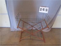 Wire basket on wood stand