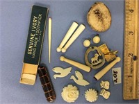 Small pieces of ivory, a jade cufflink, etc.