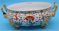 19TH C. CROWN DERBY FOOTED BOWL, LION HEADS & PAW