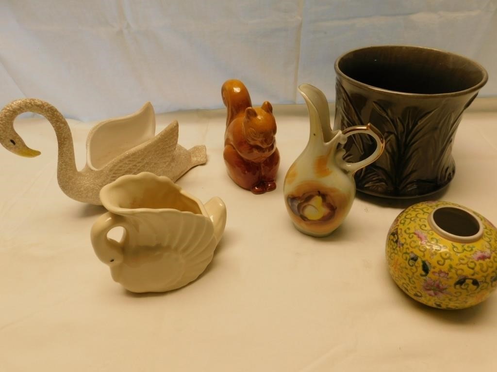Swans, squirrel, vases, planter