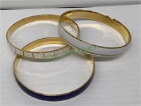 A lot of three bangle bracelets includes