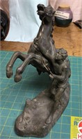 11" Metal statue of man and horse