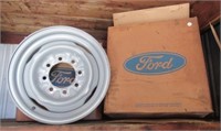 (2) Ford rims model E5UZ-1015-C.