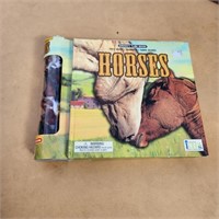 Gu horse story book with attached container of