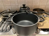 An Assorted Pots, Pans & Lids