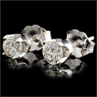 0.66ctw Diamond Earrings in 14K Gold