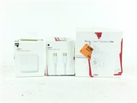 Three open box Apple accessories