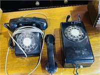 pair of black Northern Electric rotory phones