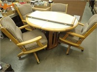 Rd. Kitchen Table w/ (4) Rolling Swivel Padded