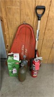 Tanks, sprayer, shovel and sled