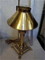 Decorative desk lamp with metal shade and oil