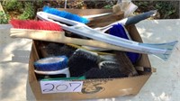 Box of misc brushes , ice scrappers