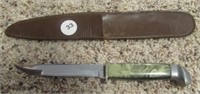 Case knife with sheath. Overall measures: 7-1/2".