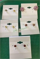 5 pierced earrings, including a pair with