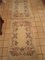 2 floral rugs 30x48