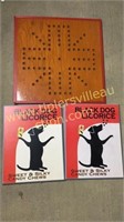 Wooden game board and pair of black dog licorice