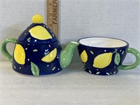 Ceramic tea set with lemons, good for putting