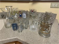 24 PC glassware - beer mugs, shot glasses, pourers