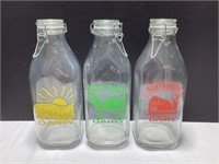 Three Decorative Milk Bottles