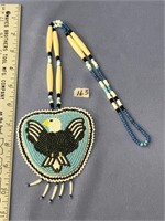 Native American beaded necklace with an eagle moti