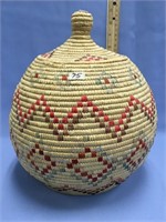 A 9.5" beautiful Hooper Bay grass basket with dyed